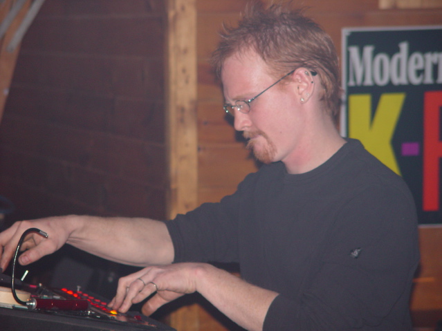 hollowe crew: john on lights at Bleachers, April 16, 2002